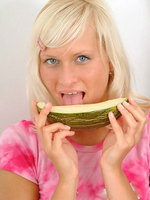 look at this hottie she is blonde and cute and has big tits and oh yea she is eating a slice of melon
